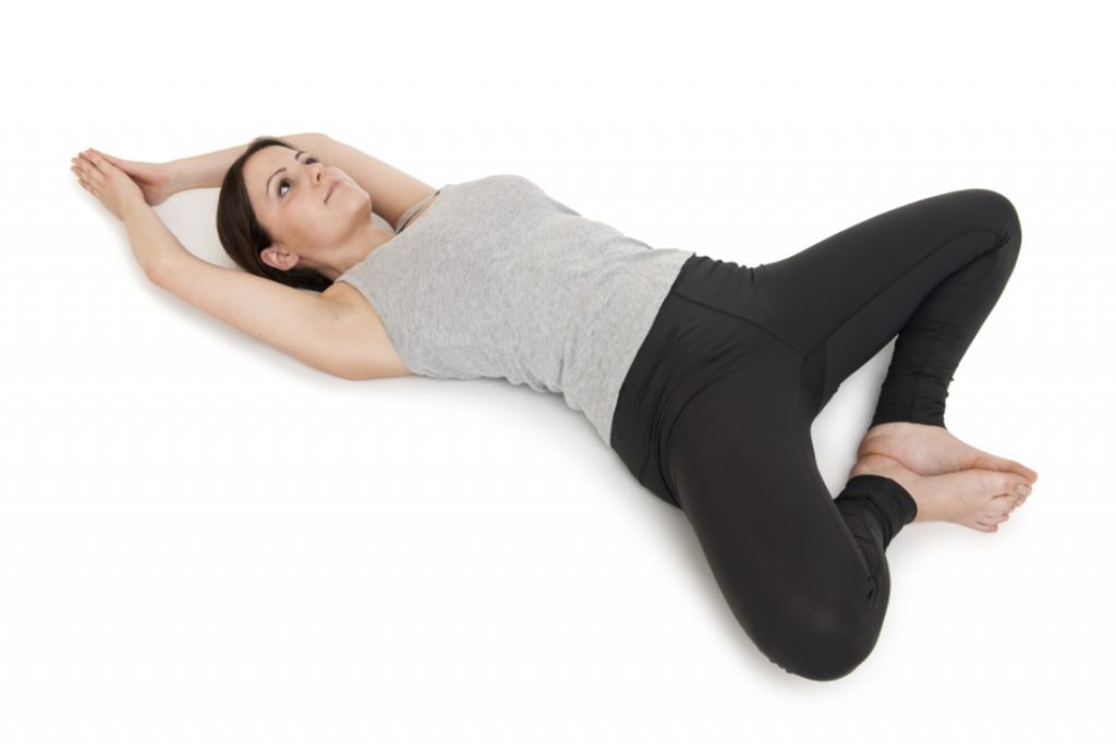 Supine Bound Angle Pose (Supta Baddha Konasana) yogamantra bali